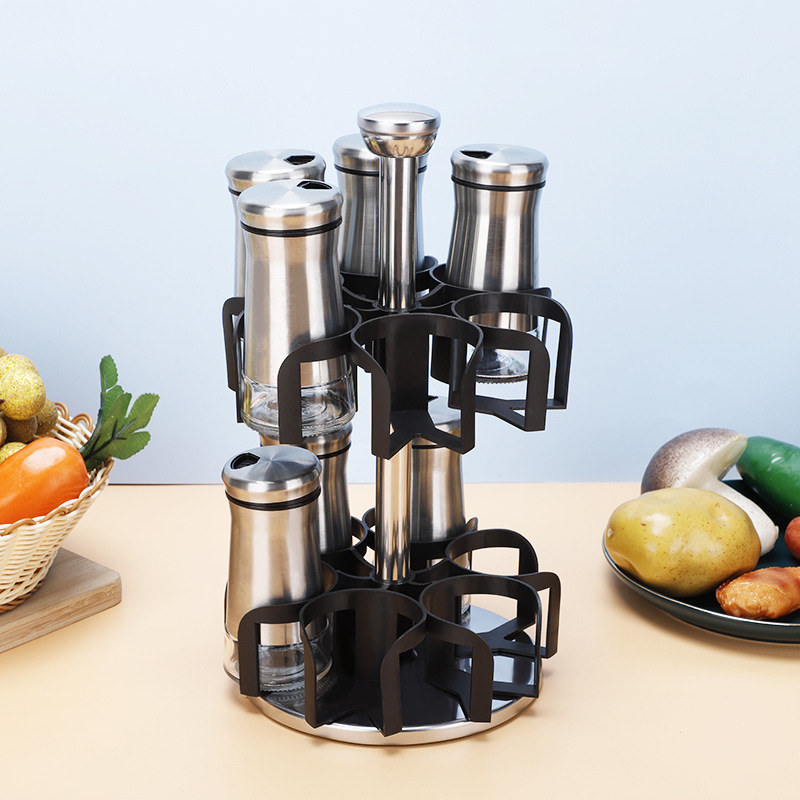 Cocina de acero inoxidable botella de condimento multifunción faro estante giratorio barbacoa condimento tarro comino botella traje al por mayor