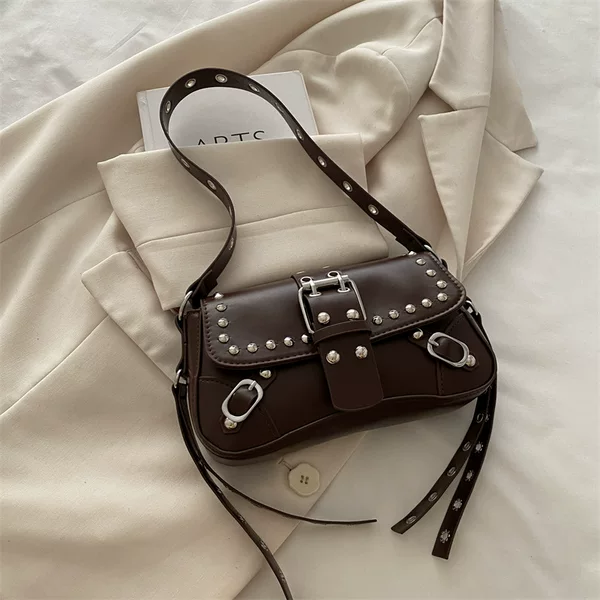 Cross-border 2026 new rivet motorcycle bag, shoulder bag, niche personalized design baguette bag, fashionable trendy underarm bag