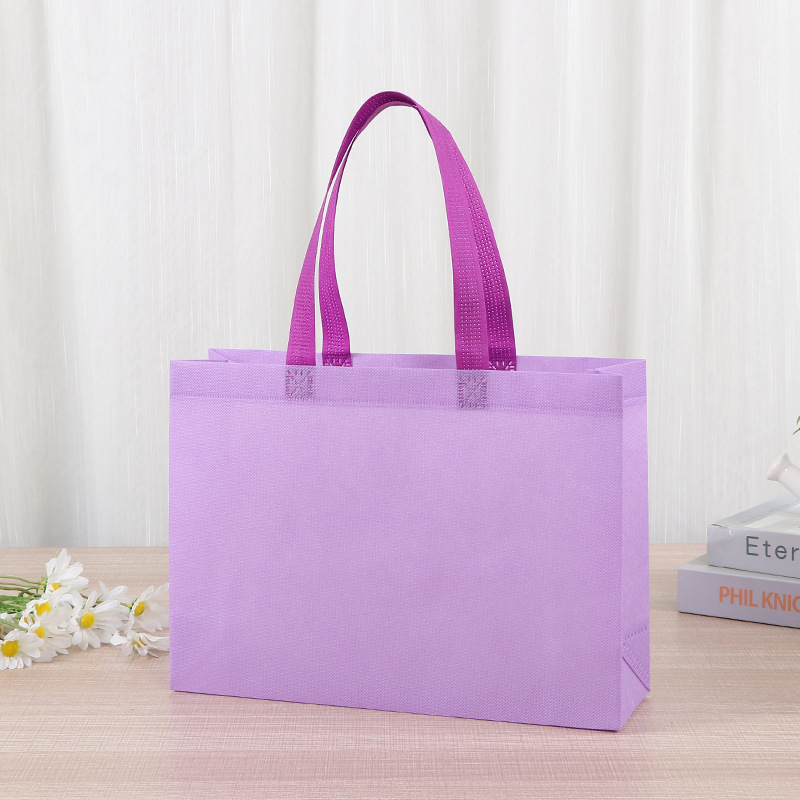 Bolsas de tela no tejida tiendas de souvenirs de viajes de madres y bebés en línea bolsa de compras de mano engrosada bolsa de mano image 10