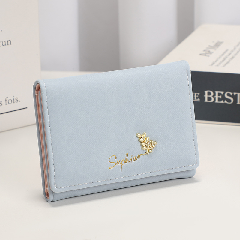 Nuevo monedero de estudiante de franela fresca pequeña de estilo nacional plegable simple, clip de dinero de sentido avanzado, billetera corta para mujer