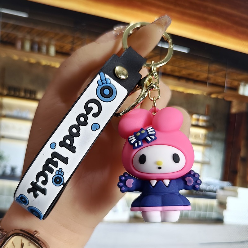 Perro de orejas grandes Melody KT gato pudín perro Kolomi caricatura de silicona llavero colgante bolsa colgante caja ciega regalo