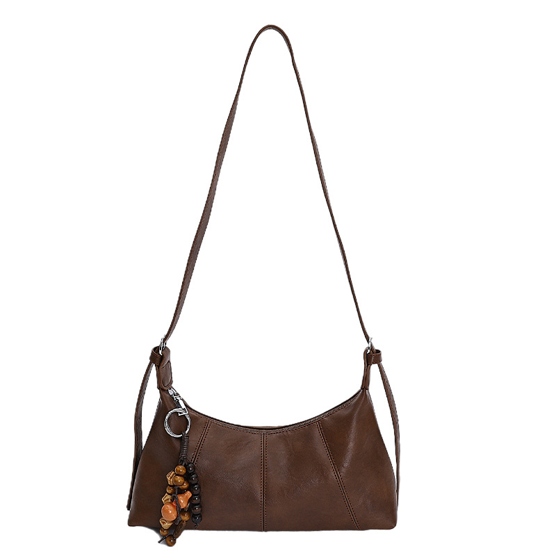 Bolsa de brazo retro transfronteriza para mujeres otoño y invierno 2025, nueva moda de nicho popular, bolsa de hombro universal, bolsa de transporte