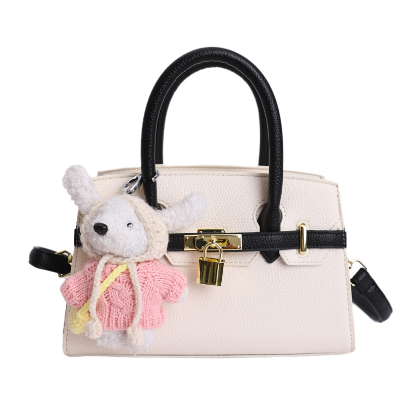 Coreano simple bolso de mano mujer 2026 primavera nueva bolsa de viaje diario texturizada bolso de mochila
