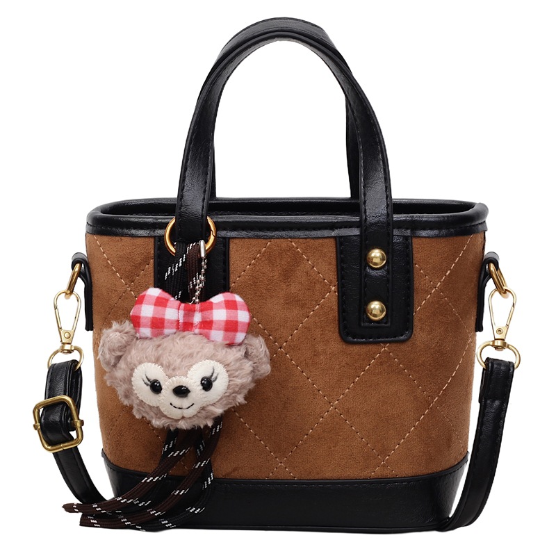 Bolso de mano de marea transfronteriza simple bolso de cubo de agua mujer otoño / invierno 2025 nuevo retro bolso de hombro bolso de viaje ocio mochila