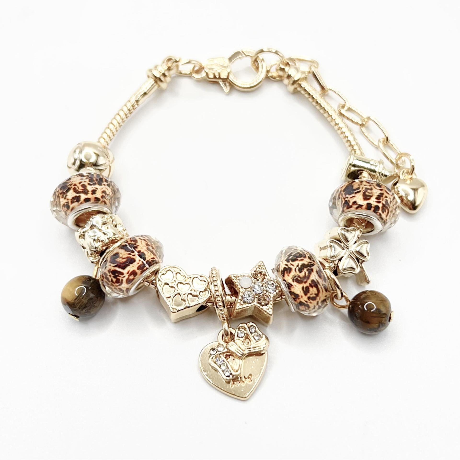 春夏の新型の小清新で甘い少女風のストライプの花の愛の蝶の数珠のブレスレットの透かし彫りのダイヤモンドの手の串