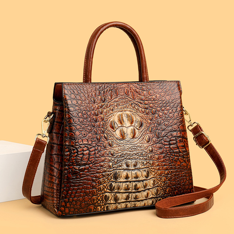 Retro alta sensación de bolso 2025 nuevo estilo de moda temperamento bolso de mano de tendencia nicho popular gran capacidad mochila