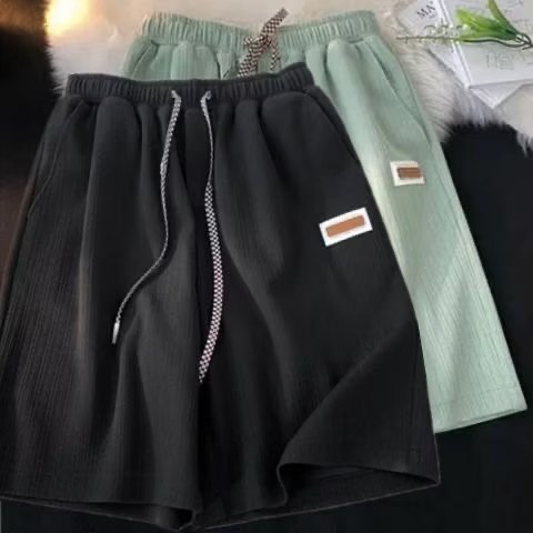 Pantalones cortos de seda de hielo de verano serie de sal suelta para hombres 2023 nuevos pantalones casuales de pierna ancha ins pantalones cortos rectos de moda