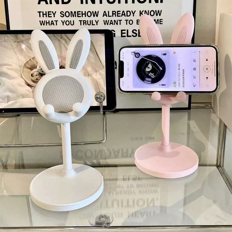 ウサギちゃんの携帯電話スタンドのデスクトップは、上に上がることができます。|undefined