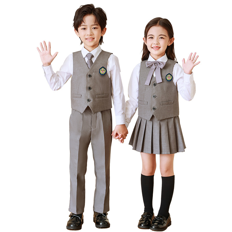 Ropa de jardín de infancia Primavera y otoño estilo británico traje vestido de primer grado ropa de cuatro piezas de escuela primaria uniforme traje