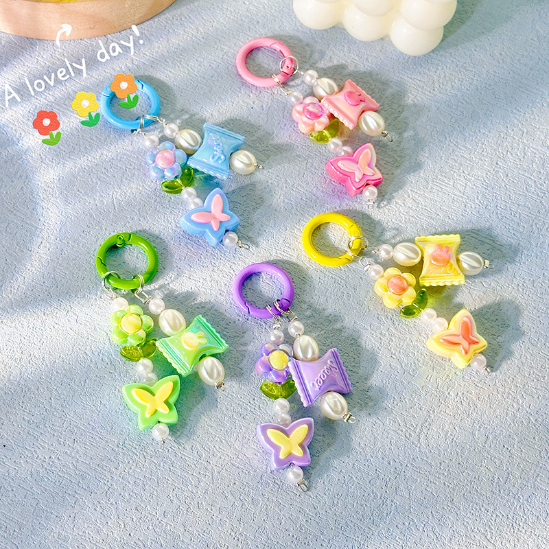 Creative butterfly flower small pendant car keychain bag ornaments earphone bag mobile phone pendant live streaming beaded chain