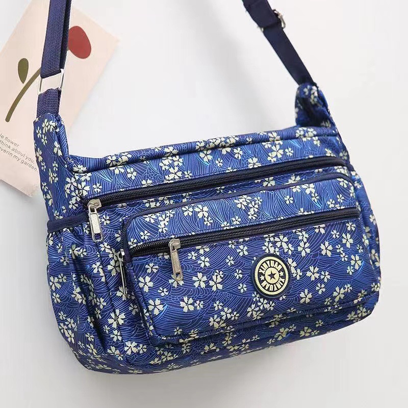 Bolsa de tela de flores bolsa de mensajero de las mujeres nueva bolsa de Madre de gran capacidad bolsa de hombro individual de mediana edad y ancianos bolsa de tela Oxford bolsa