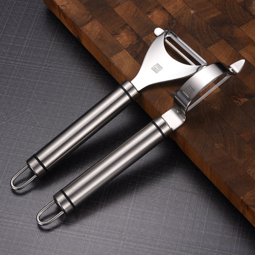Wholesale 304 stainless steel multifunctional peeler for household kitchen peeling of apples, potatoes, vegetables and melons.