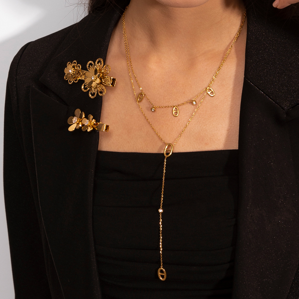 Collar de acero inoxidable de la UE y los Estados Unidos, lujo ligero, nicho de diseño universal, conjunto de joyas de nariz de cerdo, venta caliente transfronteriza