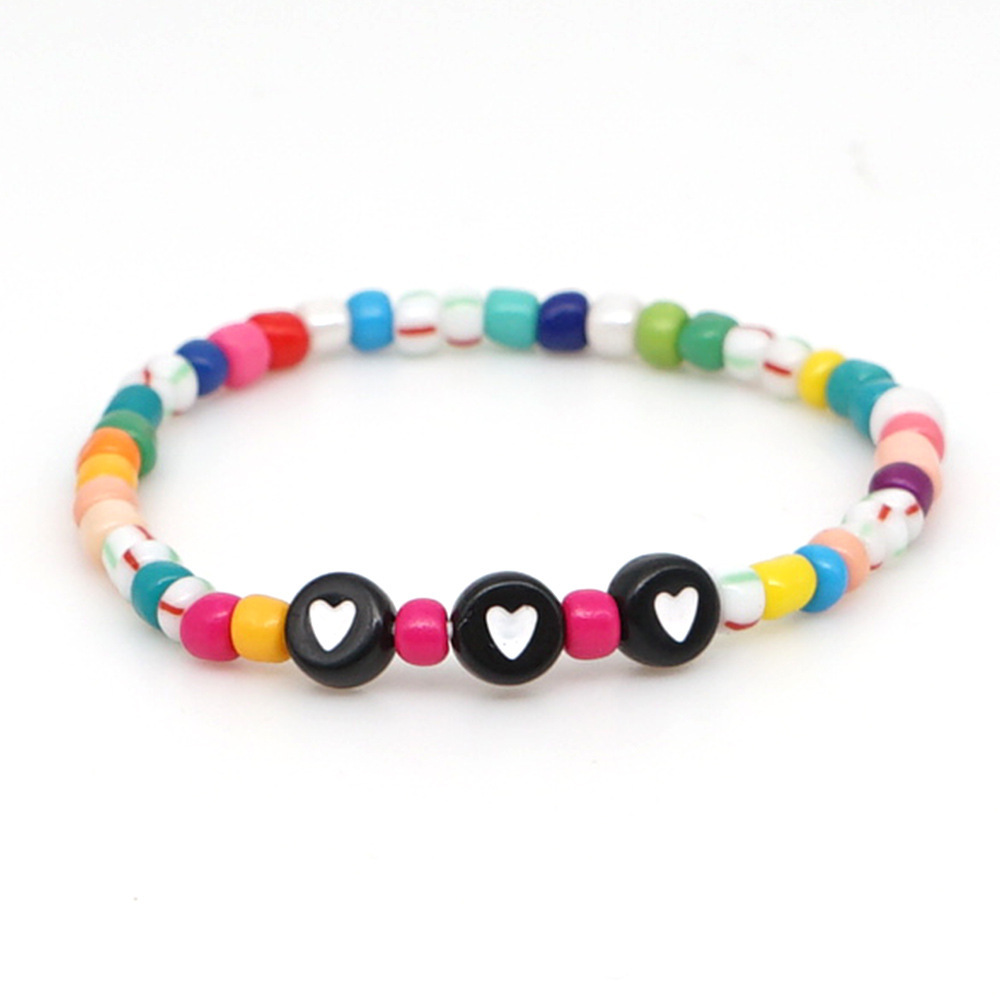 Simple Style Ethnique Bohème Coloré Perle Tissé Bracelet Femelle Ins Niche Perlé Lettre Petite Main Ornement display picture 10