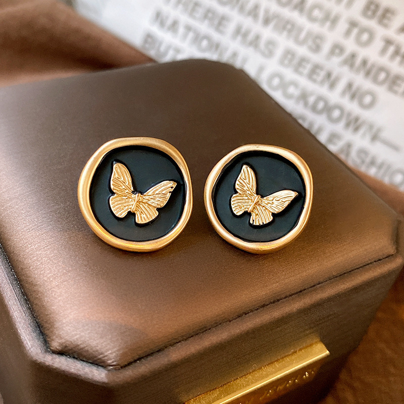Silver needle butterfly circle earrings