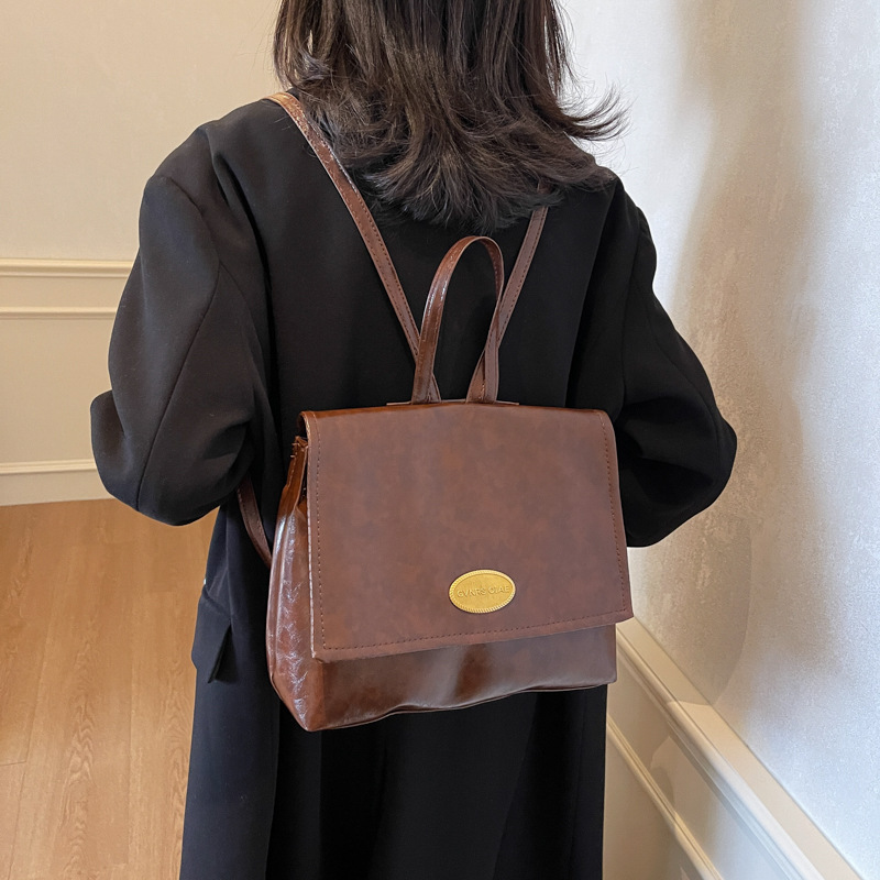 Textura avanzada de invierno de 2024 nueva versión coreana de la mochila retro para estudiantes universitarios mochila ocio