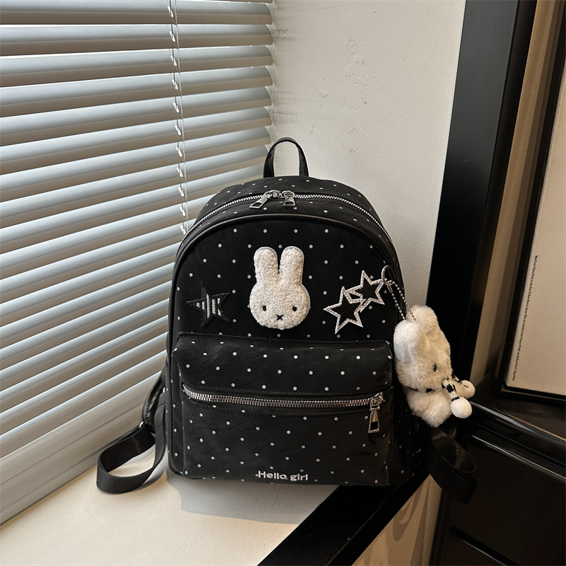 Mochila de estudiantes casuales coreana para mujeres 2026 nueva mochila de nicho de diseño de dibujos animados encantadora personalidad mochila