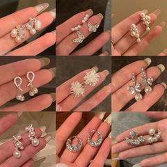 銀の針のジルコンの花の真珠のピアスは精巧で軽くて高級感があります。