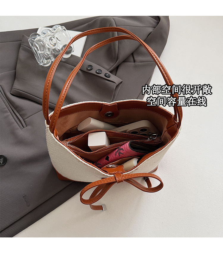 Simple and large-capacity tote bag for women 2025 new style in a two-color Korean-style casual underarm bag with a bow, fashionable and sweet undefined