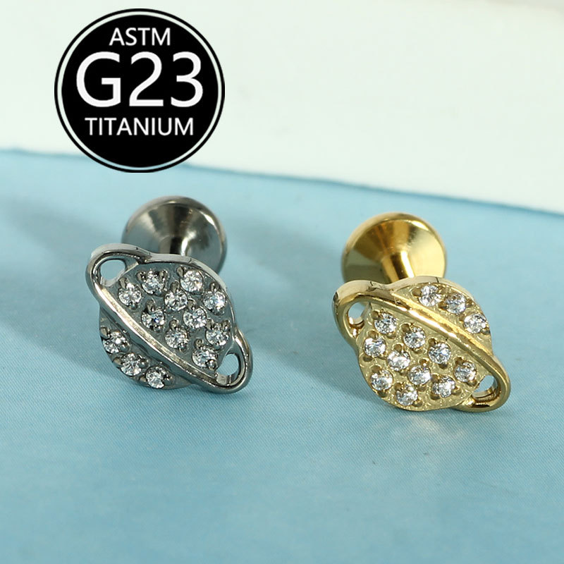 Silver pointed spike labret stud material detail
