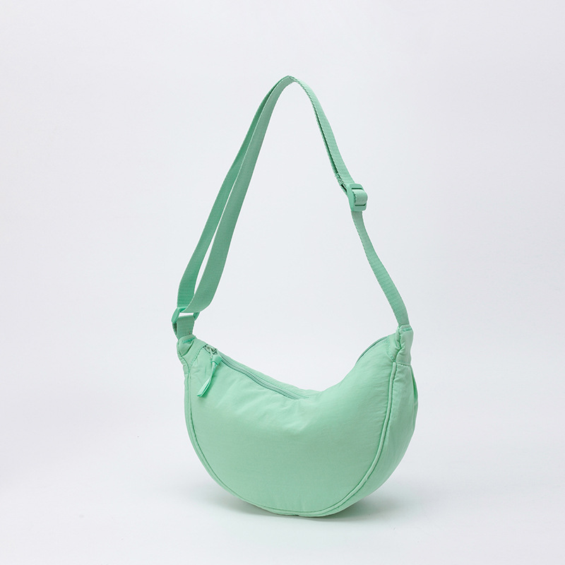 Bolso de tela pequeño bolso de moda ligero bolso de mochila de nylon transfronterizo mujer bolso de hombro casual versátil bolso de bolsas de bolsas de bollo de gran capacidad