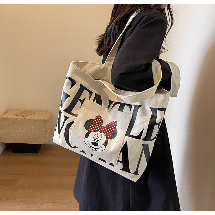 2024 New canvas bag for women, single-shoulder, student, book, large-capacity hand-held bag with zipper, versatile for office workers' commuting undefined
