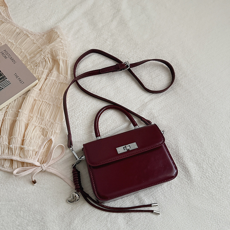 Bolsa de alto valor para mujeres 2026 primavera nuevo retro bolso de mochila diario estilo extranjero bolso de mano casual