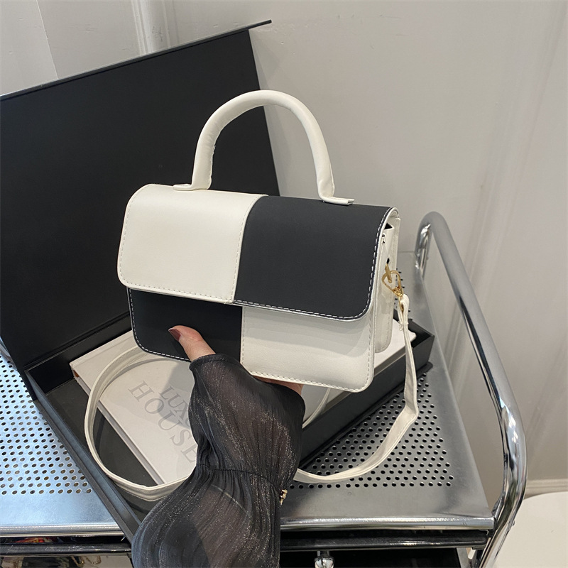 Este año, bolsos populares de color de contraste para mujeres 2024, bolsos de mochila de textura de moda de verano, bolsos de mano para mujeres
