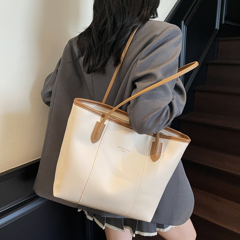 Bolso Tote nuevo producto más vendido transfronterizo para mujer de gran capacidad 2025 todo-fósforo casual simple de alta calidad bolsa de axila de un solo hombro