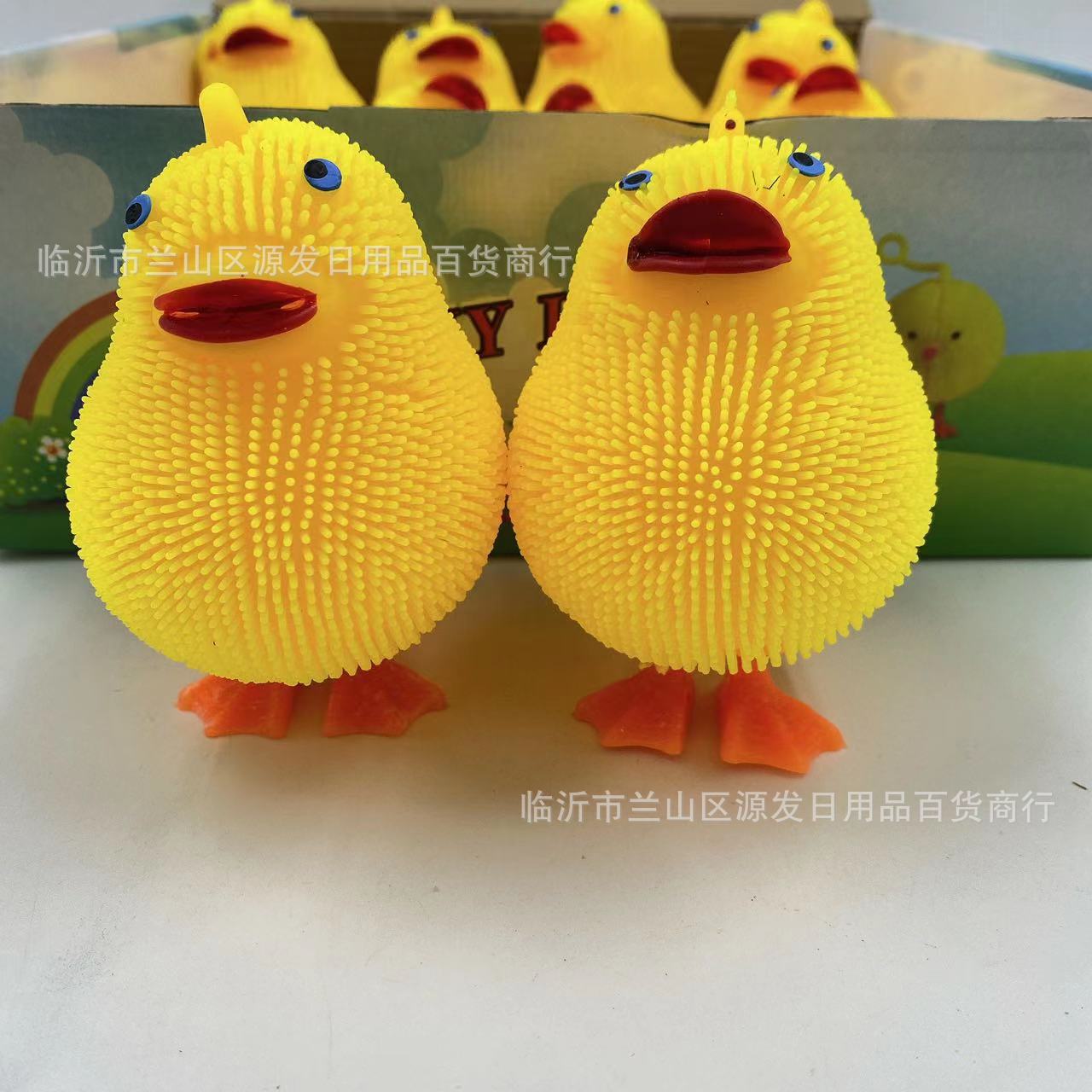 Juguete de dibujos animados flash emisor de luz pato amarillo emisor de luz bola de piel honda pato pollo pellizco música descompresión solución