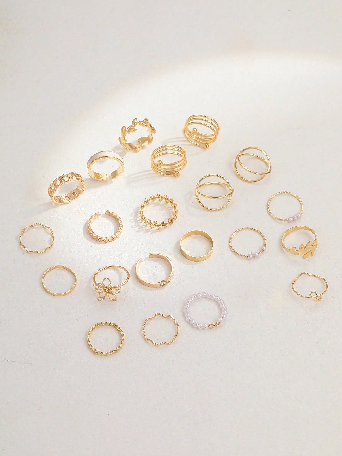 Europa y América transfronteriza nueva atmósfera creativa simple anillo de diamantes de perlas pendientes collar traje de oro al por mayor