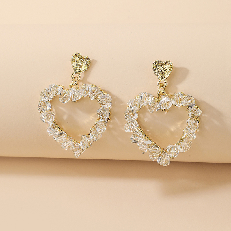 Korean Style Inlaid Crystal Heart Shaped Hollowed Alloy Stud Earrings Wholesale display picture 3