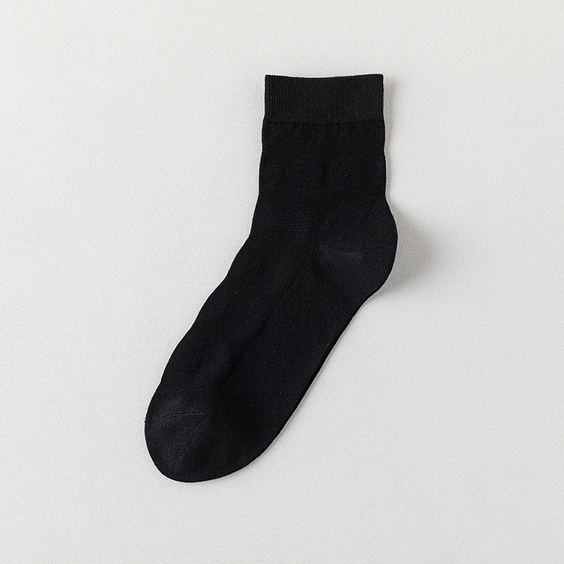 Calcetines de algodón de color sólido para hombres primavera y otoño medio tubo de diamante sin hueso transpirable absorción de sudor embalaje independiente calcetines de hombre al por mayor