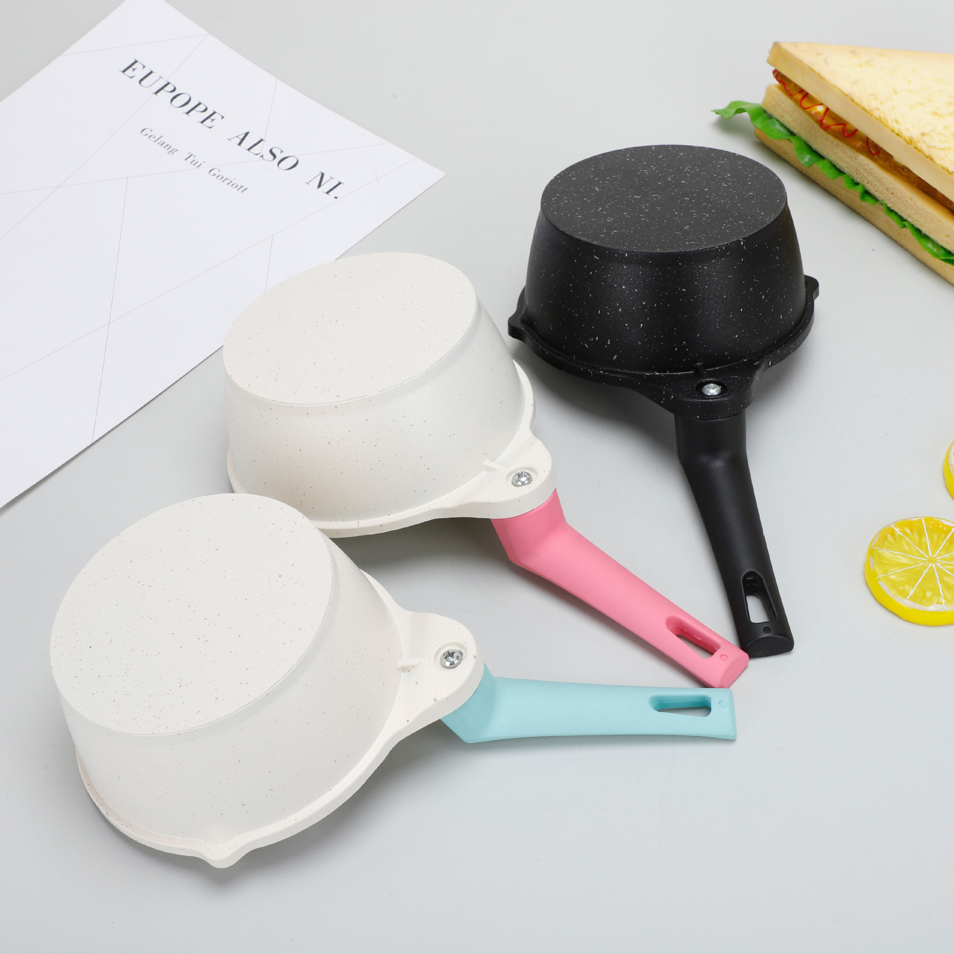 Nuevo tipo de aceite caliente de cocina de grano mini artefacto de aceite de arroz rociante de piedra de arroz de grano especial de cocina de grano de grano de mango de madera