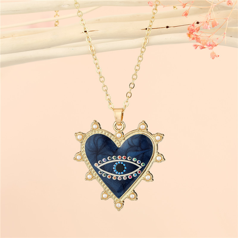 Bohemian Rhinestone Lucky Devil Eye Pattern Heart Pendant Necklace display picture 3