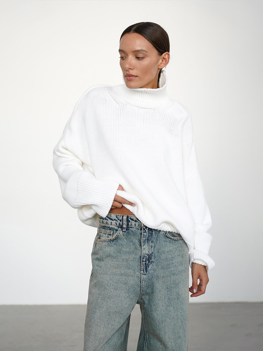 Suéter de cuello alto transfronterizo para mujeres 2025, Europa y los Estados Unidos de otoño y invierno explosivo color sólido jersey de punto de cuello alto suéter suelto para mujeres