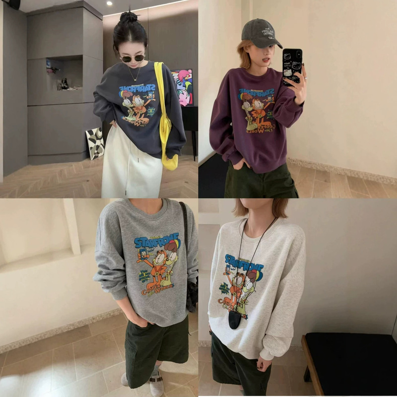 2026 Korean style! Garfield cartoon print round neck long sleeve women's sweatshirt, windproof casual versatile top 2026 Korean style! Garfield cartoon print round neck long sleeve women's sweatshirt, windproof casual versatile top