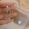 Asymmetrical long earrings from pearl, Korean style, flowered, cat's eye