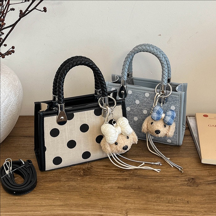 Corea del Sur Xiaozhong wave punto bolso de mano simple bolso pequeño para mujeres 2026 nueva moda versátil viaje mochila de hombro