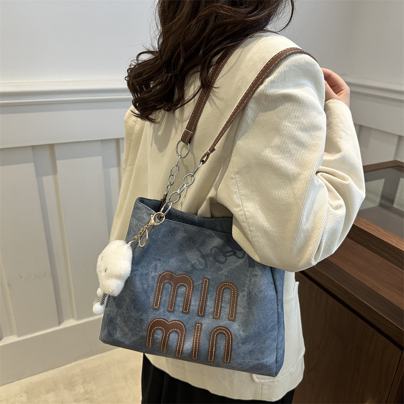 Bolso de otoño de mujer de gran capacidad de transporte 2024 nuevo bolso de hombro de moda nicho de alto nivel bolso de brazo