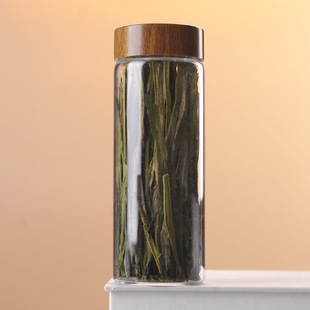 Factory supply Tea bottled transparent glass small jar bamboo grain lid gift box monkey Kui green tea single bottle tall bottle