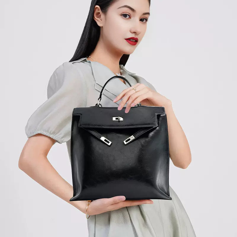 秋冬新款韩版小众通勤手提背包 真皮大容量女士时尚高级感双肩包