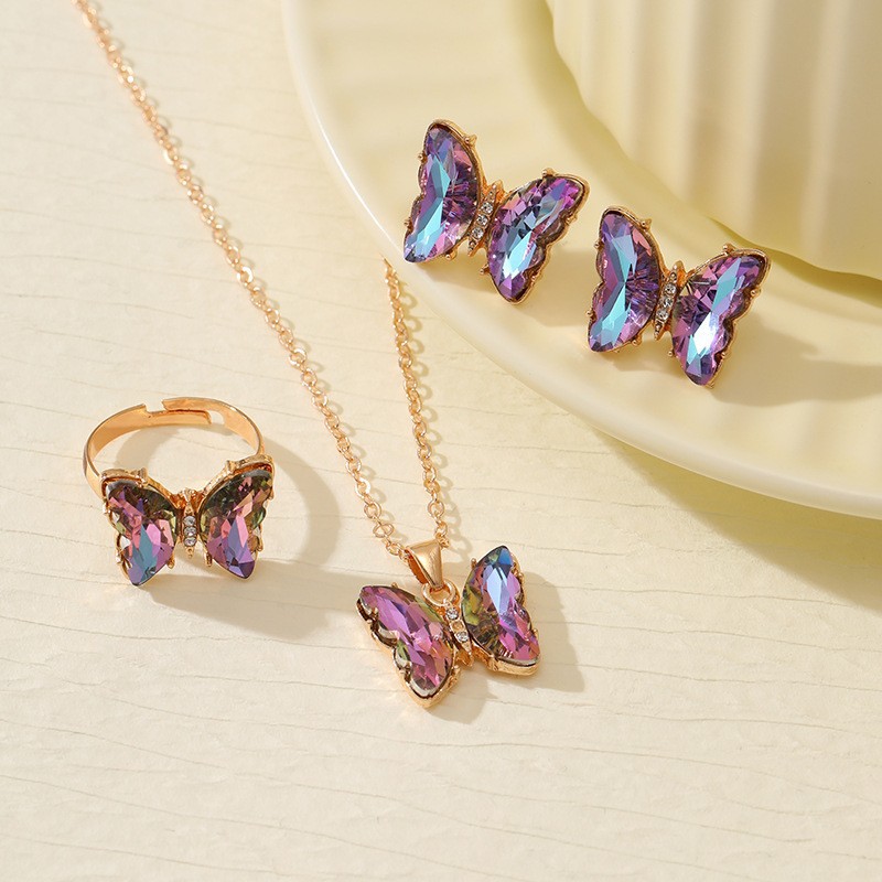 Ventas transfronterizas calientes coloridas 3 piezas de aretes collar anillo de moda europea y americana mariposa elegante collar de diamantes para mujeres