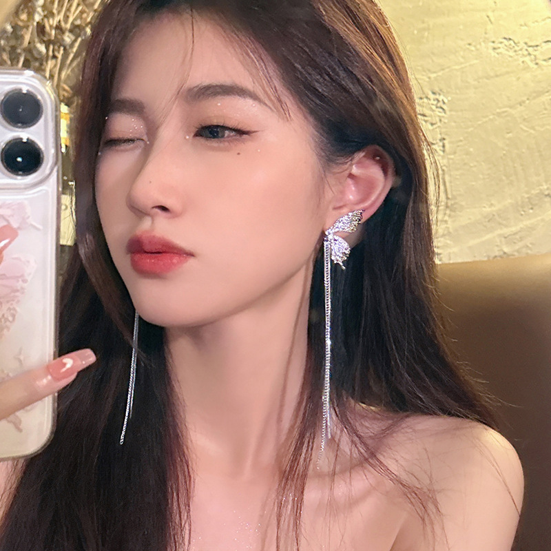 Brand earrings with tassels