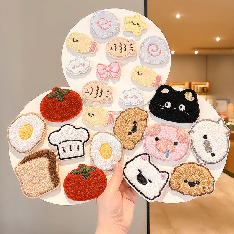 Cartoon 2026 new style hair accessories for girls, featuring cute and fun designs for autumn and winter, including side-swept bangs and Velcro closures