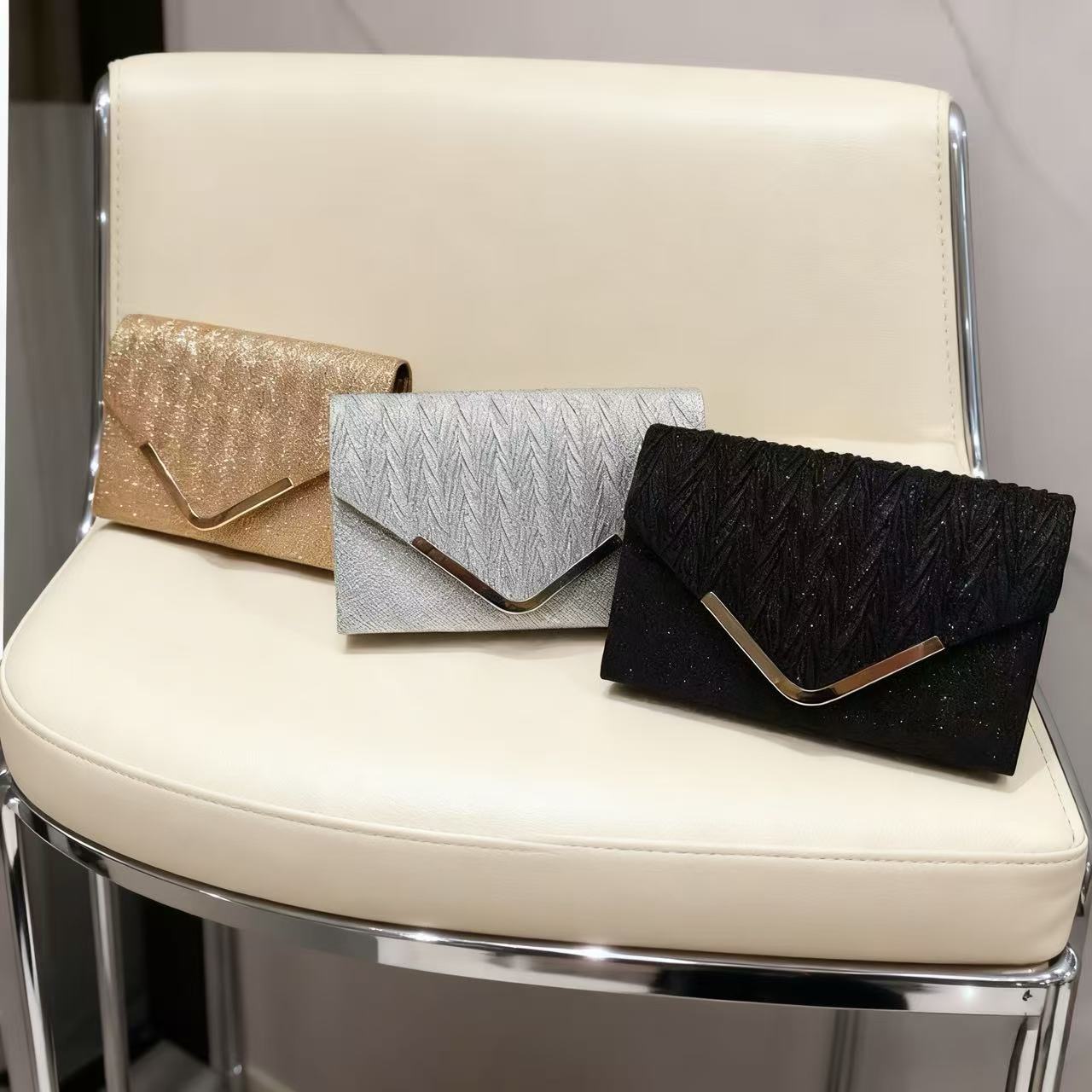 Cross-border nueva bolsa de cena de damas lujosa esquinilla pliegue de alta sensación bolsas de mano bolsa de fiesta de moda bolsa de cena