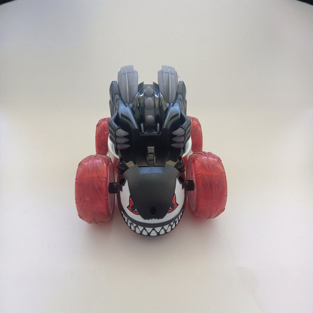 Cross-border 2.4G veneno acrobacias carro de rol juguetes para niños F1 360 grados veneno y ruido carro de control remoto