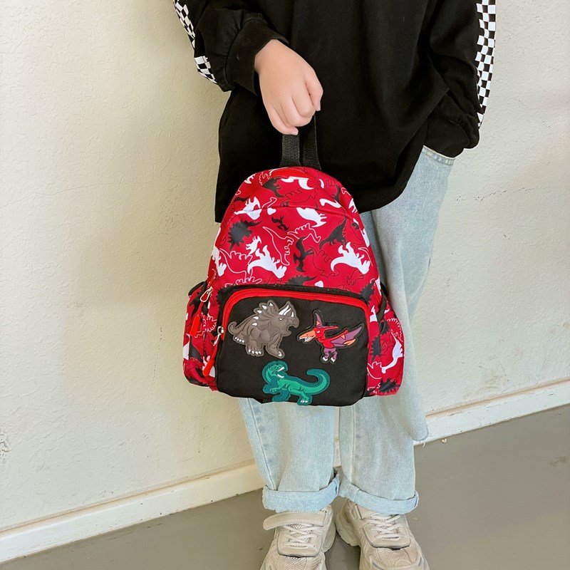 Mochila infantil de dinosaurios de dibujos animados, 2025 mochila escolar de jardín de infantes, nueva mochila de comercio exterior para niños y niñas