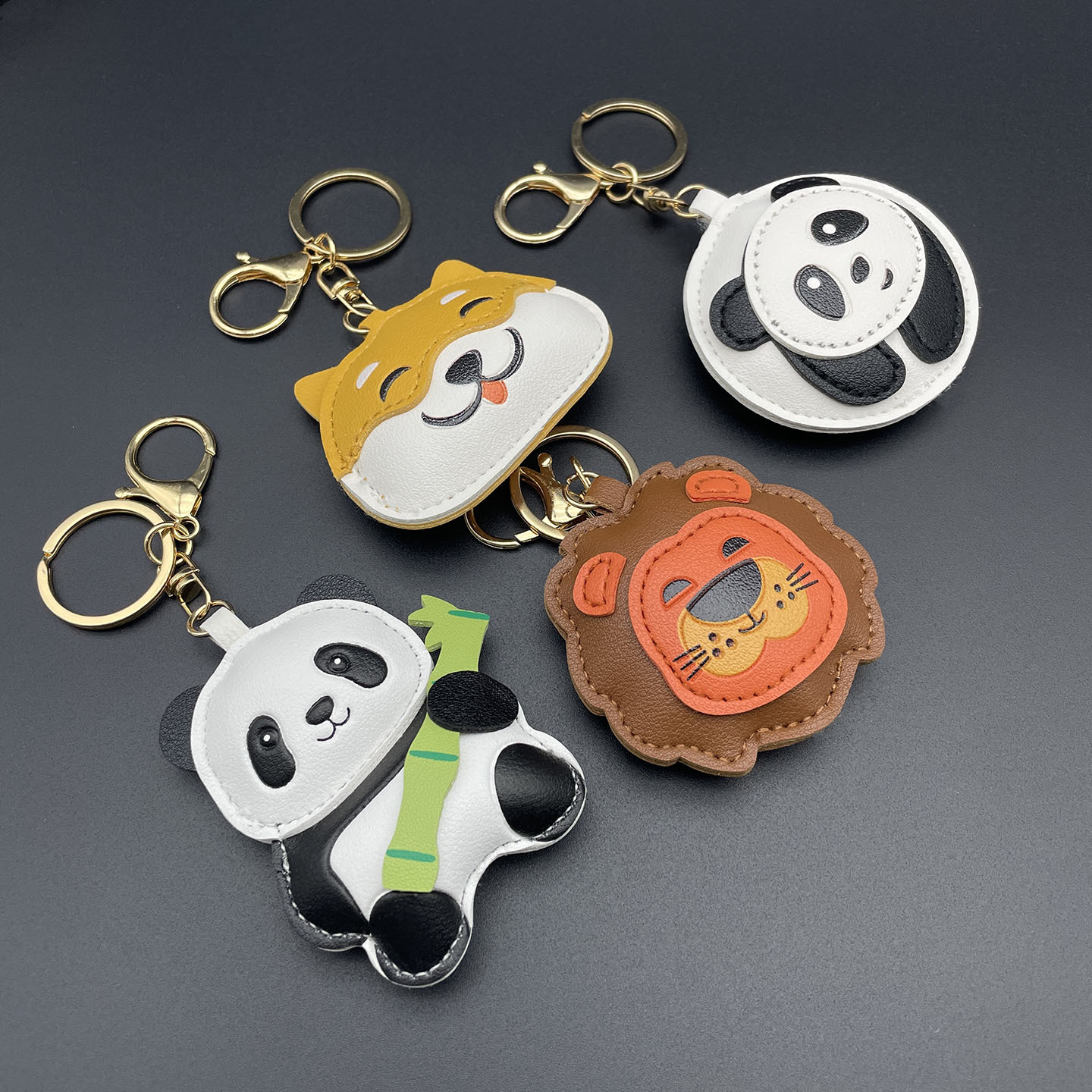 Nuevo cuero PU lleno de algodón animal pequeño bolso de llaver para colgar perros panda leones DIY colgar pequeños regalos image 1