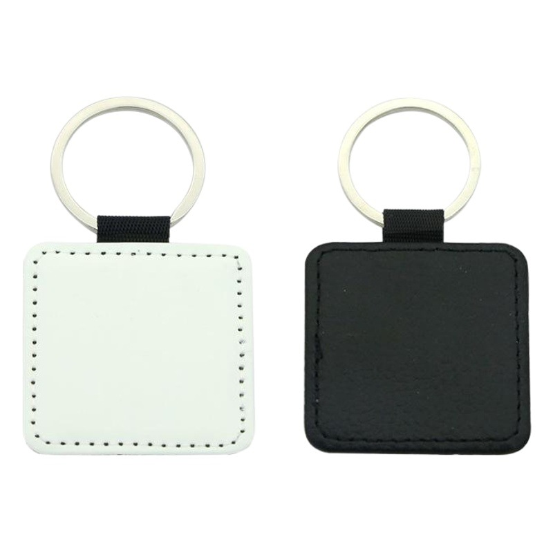 Fabricante suministra llaveros de transferencia de calor, llaveros de cuero PU en blanco con borde de una sola cara, fabricante de origen en Jiangsu